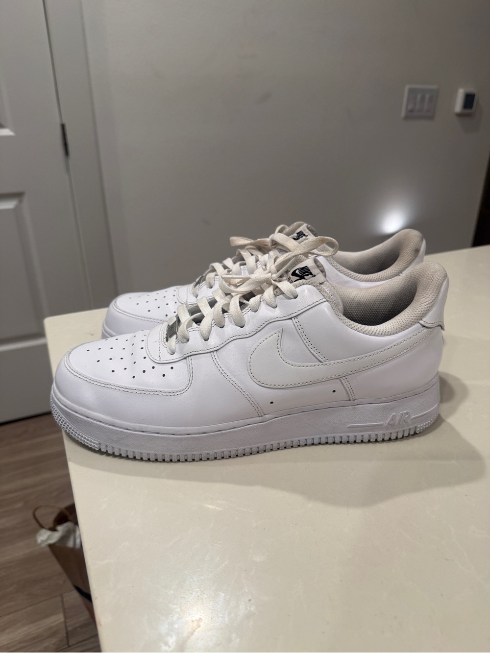 Nike Men’s All-White Low-Top Sneakers